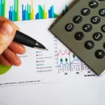 A hand holding a pen over paperwork about Cove Capital DSTs