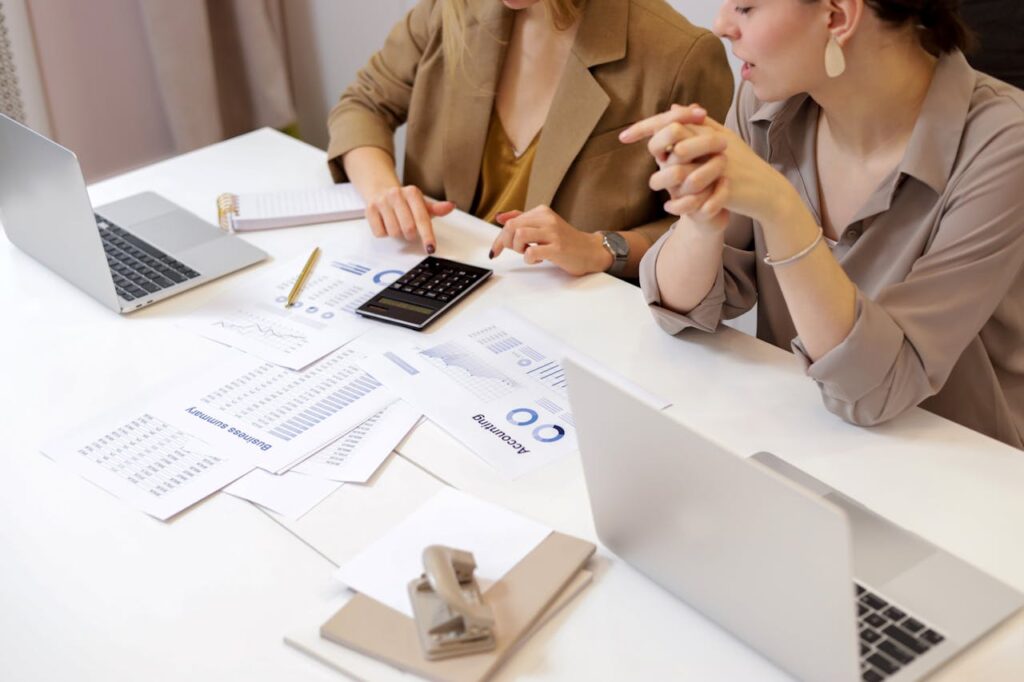 Two people discussing the risks of investing in UITs