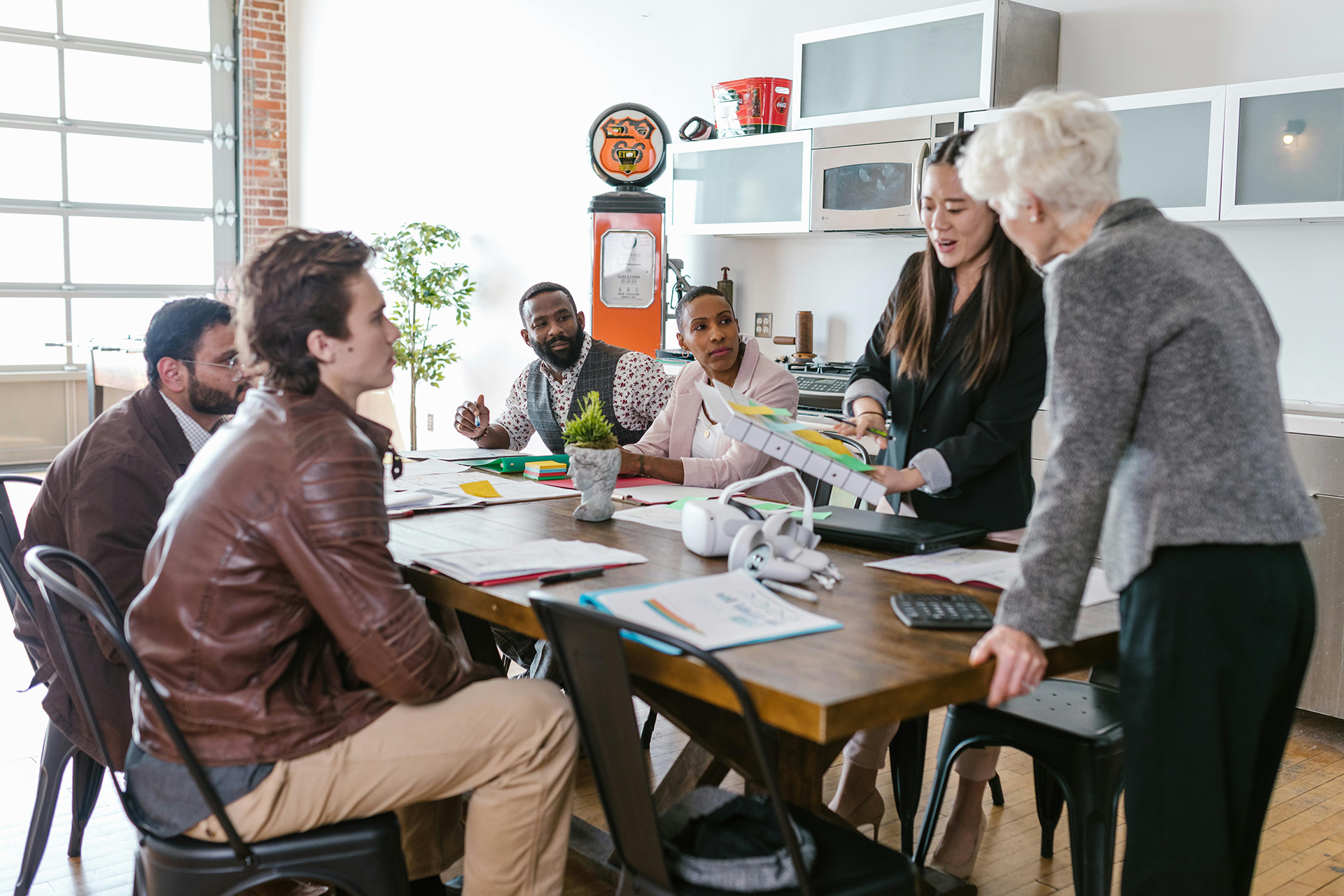 A group of people discussing a FINRA CRD number