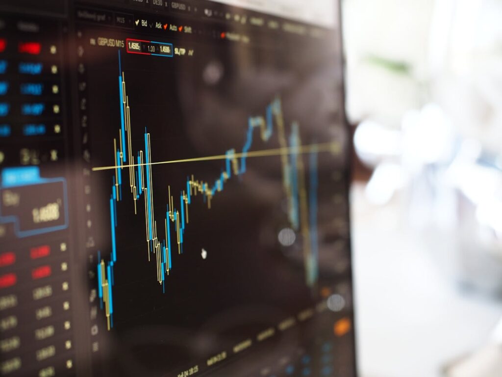 A monitor displaying an investment’s performance