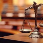 Rita Mansour and McDonald Partners, Lawsuit Investigation featured by top securities fraud attorneys, The White Law Group.