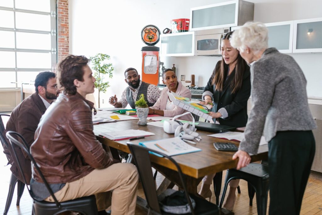 A group of investors discussing examples of conflicts of interest