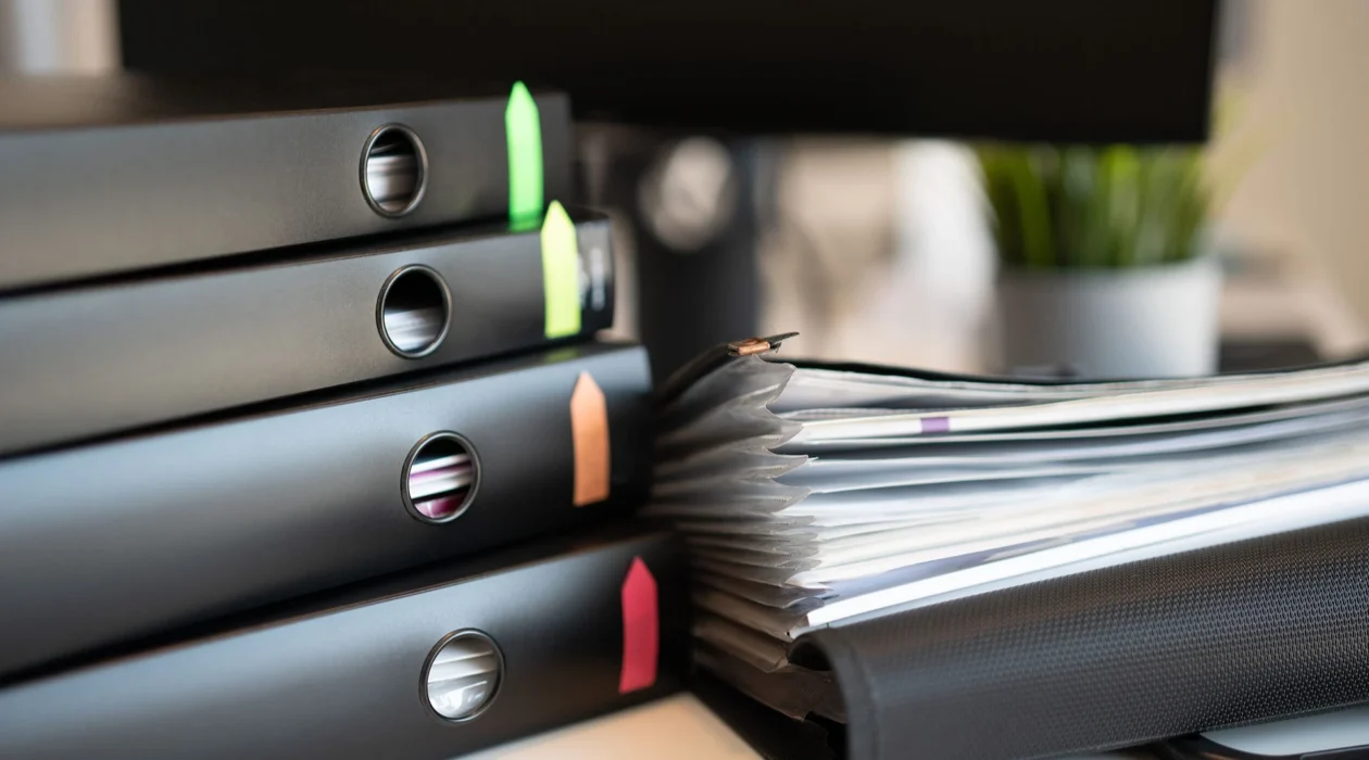 A stack of binders, illustrating what evidence supports your FINRA claim
