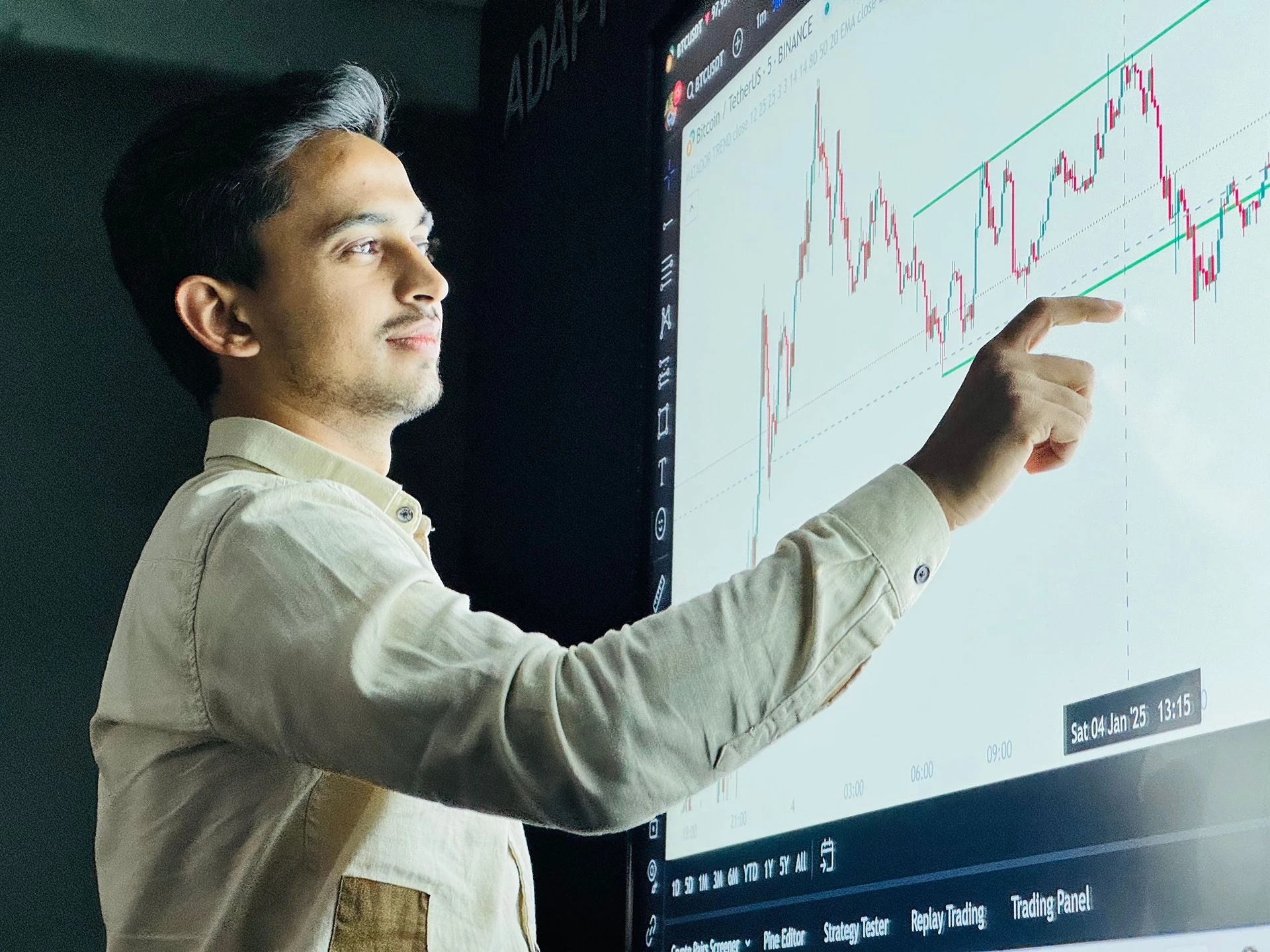 Investor reviewing market data and charts related to types of investment fraud
